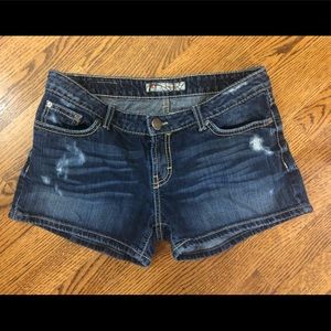 BKE Stella 3” distressed jean shorts.